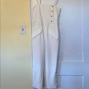 Fletch, white jumpsuit